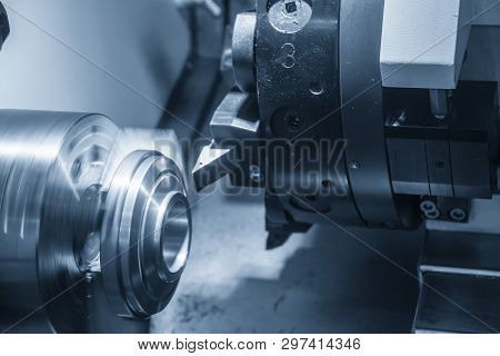 The Cnc Lathe Machine  Cutting By The Facing Cutter. Hi-technology Automotive Part Manufacturing Pro