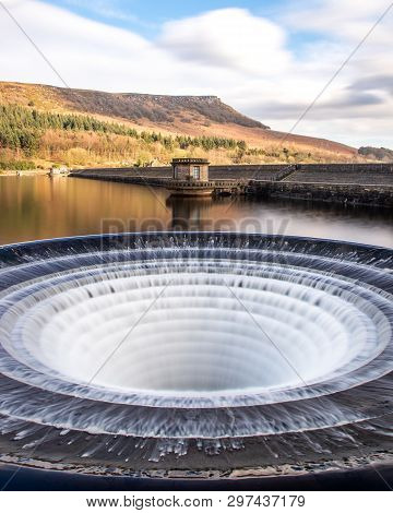 Overflow Or Bellmouth, Ladybower Reservoir In The Peak District National Park. The Reservoir Has Two