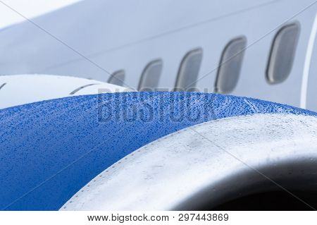 View Of The Engine Of The Aircraft, Raindrops On A Wet Surface