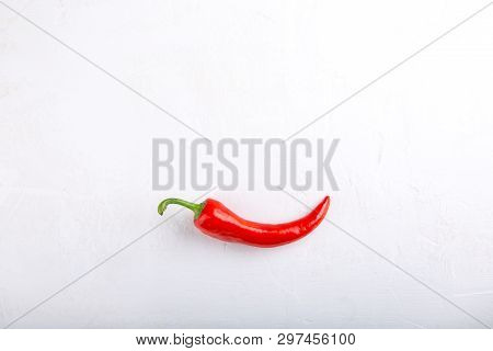 Red Chili Pepper On White Background. Top View, Copy Space, Flat Lay, Close-up. Food Concept.