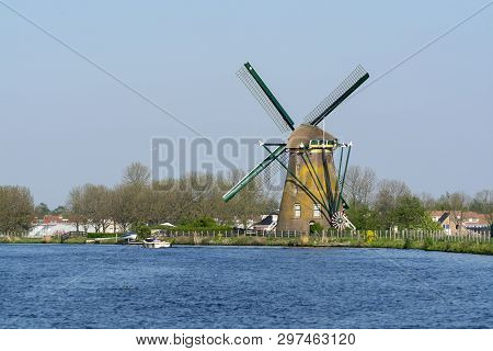 Waterways Of North Holland And View On Traditional Dutch Wind Mill, Spring Landscape