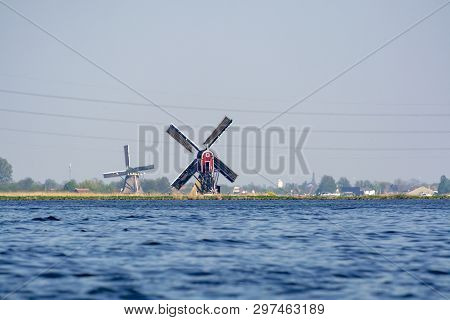 Waterways Of North Holland And View On Traditional Dutch Wind Mill, Spring Landscape