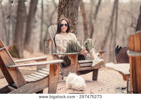 Woman Relaxing In The Forest On Weekeend