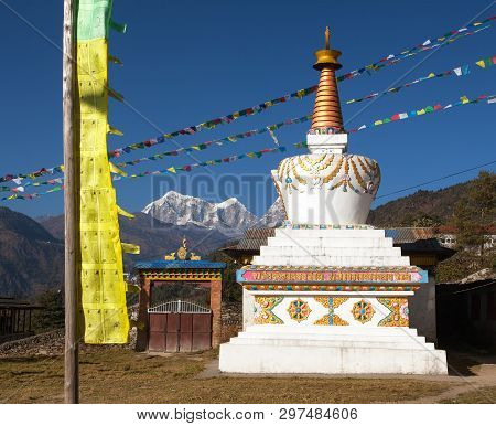 View Of Stupa, Pagoda Or Chorten And Prayer Flags. Monastery In Sallery Village, Nepal Himalayas Mou