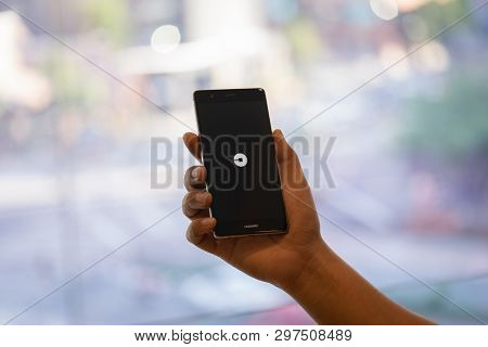 Chiang Mai, Thailand - Oct. 28,2018: Man Holding Huawei With Uber Apps. Uber Is Smartphone App Trans