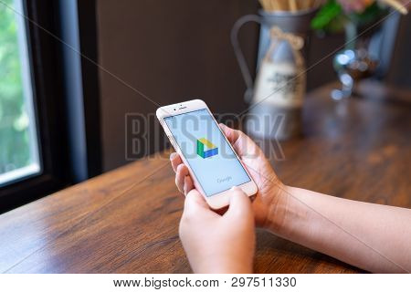 Chiang Mai, Thailand - Apr.08,2019: Woman Holding Apple Iphone 6s Rose Gold With Google Drive Apps O