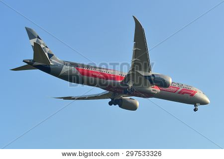 Passenger Airplane Landing At The Airport