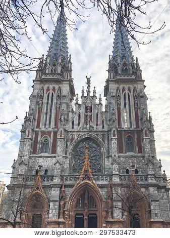 Old Ancient Medieval Gray Creepy Scary Catholic, Orthodox Gothic Church With Spiers. European Archit