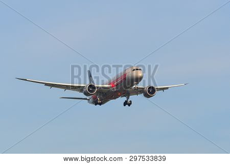 Passenger Airplane Landing At The Airport