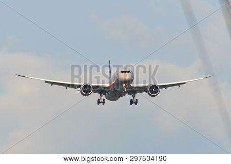 Passenger Airplane Landing At The Airport