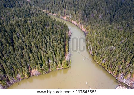 Aerial drone view of Red Lake between Hasmas Mountains in Transylvania, Romania.