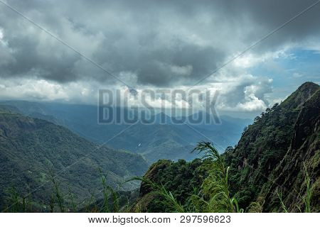 Natural View Of Layers Of Hills Deep Into The Valley.