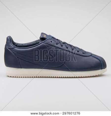 Vienna, Austria - August 7, 2017: Nike Classic Cortez Premium Qs Tz Blue Sneaker On White Background