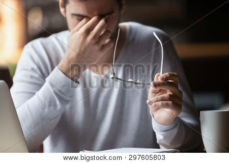 Tired Of Computer Businessman Taking Off Glasses Feels Eyestrain