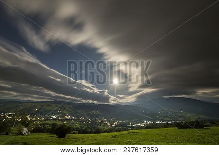 Summer Night Mountain Panorama. Green Grassy Mountain Clearing, Spruce Trees On Blue Evening Sky Cop