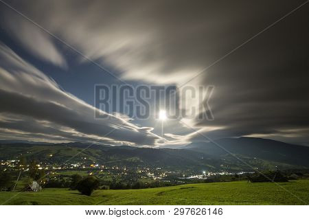 Summer Night Mountain Panorama. Green Grassy Mountain Clearing, Spruce Trees On Blue Evening Sky Cop