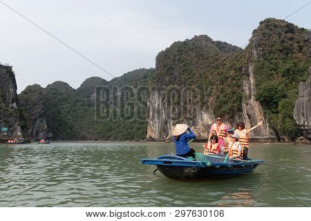 Halong Bay,vietnam:march 29 2019 - Tourist Travel By Ship To Halong Bay Limestone Islands In Northes