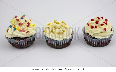 Muffin. Chocolate Muffin, Chocolate Muffin With Cream And Berries, Place For Text