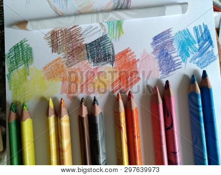 Six Pairs Of Colored Pens Lie Next To The Interval, Painting On Paper With Colored Spots, Creative E