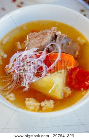 Uzbek Chorba - Soup From Fresh Meat And Vegetables On White Table, Great Image For Your Needs.