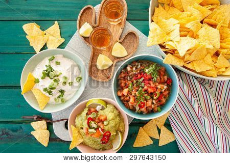 Delicious Homemade Guacamole And Tomato Salsa With Tortilla Chips