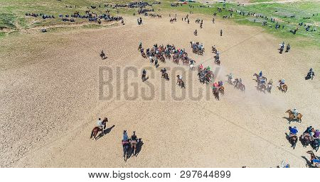 Herd Of Horses View From Drone Frightened Horse Stands On Its Legs During Traditional Game At Karako