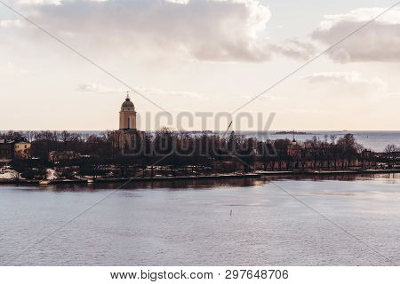 Suomenlinna Fortress On A Sunny Spring Day With The Church Lighthouse Tower And Clouds, Helsinki Fin