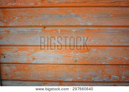 Background Of Orange Flaky Wood Backdrop Of Red Colored Wooden Panels With Aged Flaky Surface