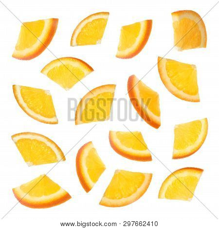 Set Of Cut Ripe Juicy Oranges On White Background