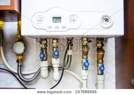 Wall Double-bithermic Boiler Heating Hot Water In The Interior