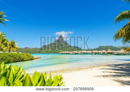 View On Mount Otemanu Through Turquoise Lagoon And Overwater Bungalows On The Tropical Island Bora B