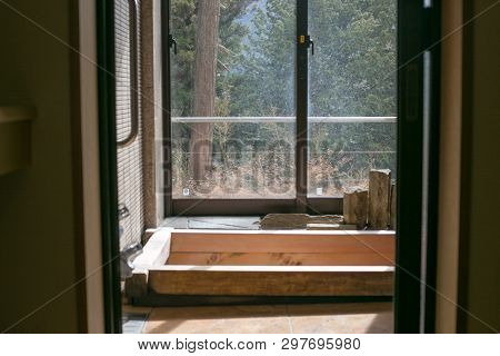 Gifu, Japan - April 11, 2019 : Japanese Style Private Onsen Bathtub In A Traditional Ryokan Hotel Wi