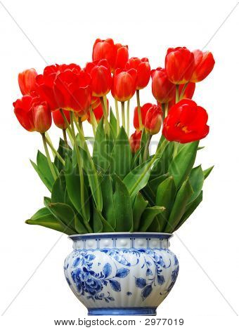 Vaas met rode tulpen