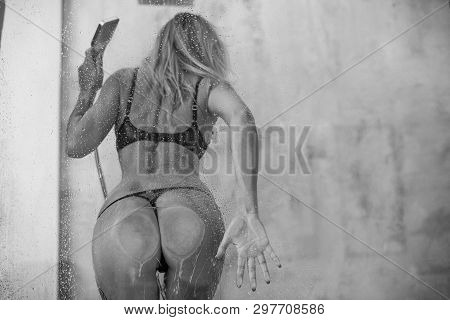 The Girl Pressed Beautiful Sexy Ass In A Thong , Glass Shower Enclosure, Lots Of Drops. Close-up Of 