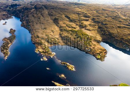 Aerial View Of Lough Doon Between Portnoo And Ardara Which Is Famous For The Medieval Fort - County 