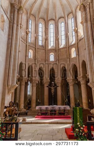 Alcobaca, Portugal - July 17, 2017: Altar or Main Chapel, ambulatory and apse of Monastery of Santa Maria de Alcobaca Abbey. Medieval Gothic architecture. Cistercian Religious Order