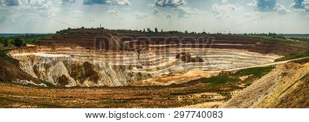 Excavator Loading Dump Truck With Raw Kaolin In Kaolin Open Pit, Vetovo City, Bulgaria