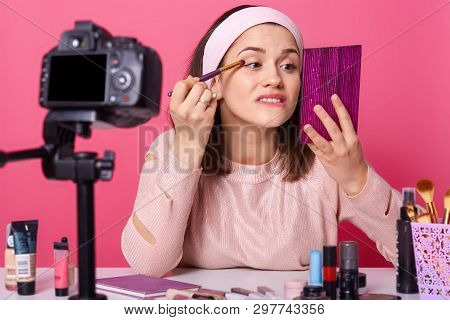Close Up Portrait Of Young Caucasian Woman Blogger, Advertising New Eyeshadow For Her Followers, Onl
