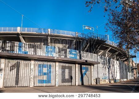 The Exterior Of The Football Stadium Where Atalanta Plays. On The Wall With Numbers And Text.on Back