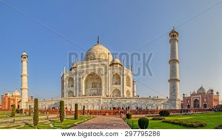 Agra, India - March 5 2018: Tourists Sighteseeing, Exploring And Admiring Famous The Taj Mahal