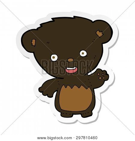sticker of a cartoon black bearcub waving