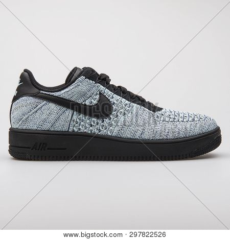 Vienna, Austria - August 7, 2017: Nike Air Force 1 Ultra Flyknit Low Grey And Black Sneaker On White