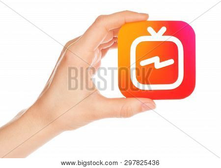 Kiev, Ukraine - February 21, 2019: Hand Holds Instagram Tv Icon Printed On Paper. Igtv Is A Standalo