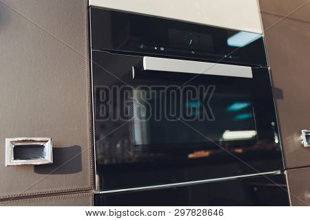 Single Wall Oven Isolated. Household And Integrated Kitchen Domestic Appliances. Front View Of Stain
