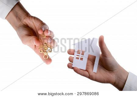 Hand Holding An Isolated Paper House With A White Background