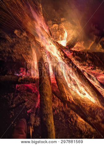 Close The Fire Flame Of Marching Fire, Super Slow Motion Of Burning Wood. Bright Bonfire With Beauti
