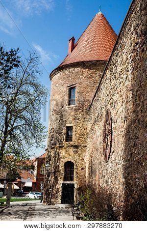 Zagreb, Croatia - April, 2018: Kaptol Fortress And The Antique Rusty Clock Removed From The Zagreb C