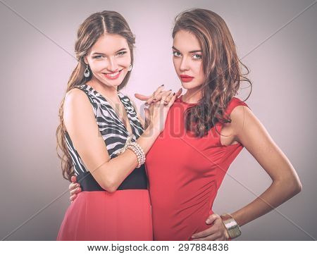 Two Young Beauty Women Standing Together . Two Young Beauty Wome