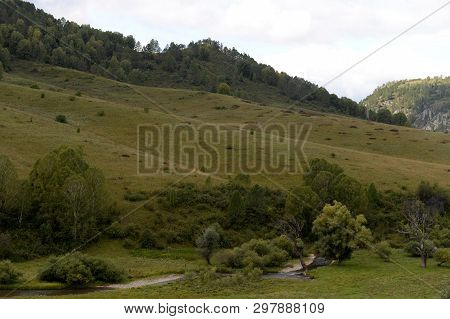 Mountain Landscape In The Vicinity Of The Taiga Settlement Of The General Of The Altai Territory In 