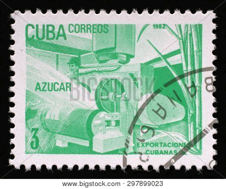 ZAGREB, CROATIA - SEPTEMBER 02, 2014: A stamp printed in Cuba, shows Sugar processing plant, Exportaciones cubanas, circa 1982